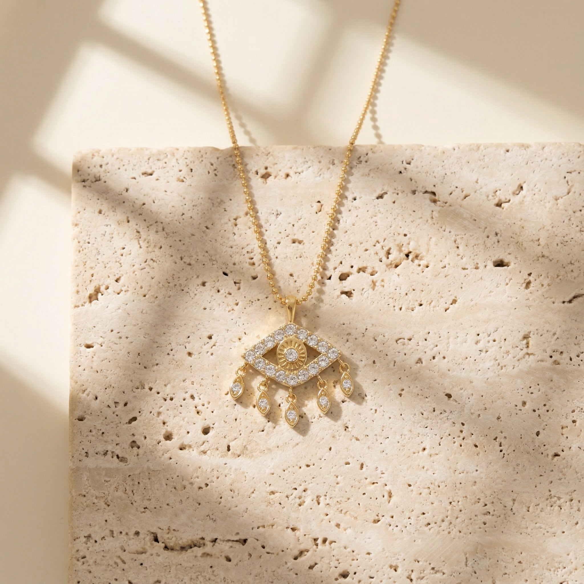 Protective evil eye necklace designed to bring strength, clarity and positive energy