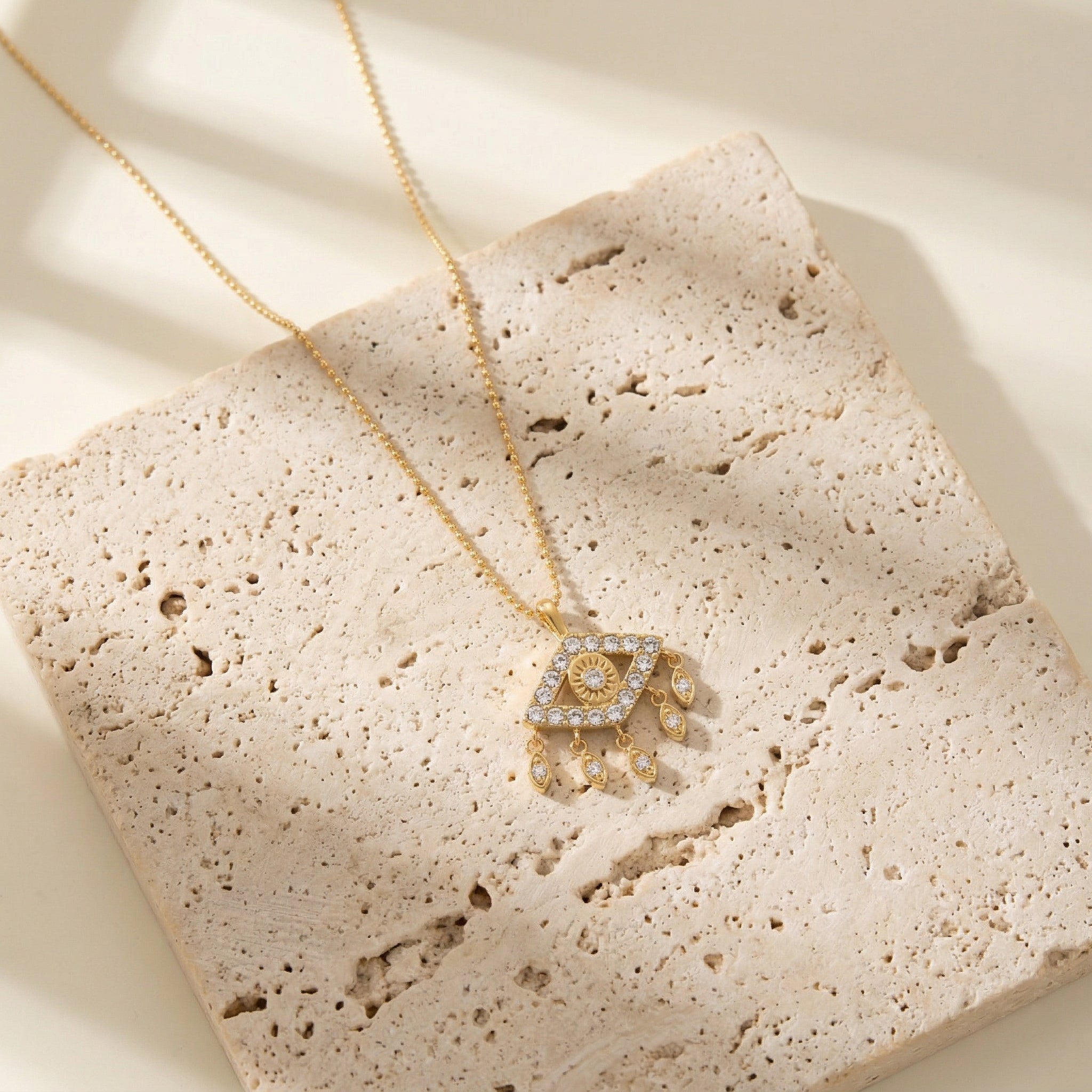 Protective evil eye necklace designed to bring strength, clarity and positive energy