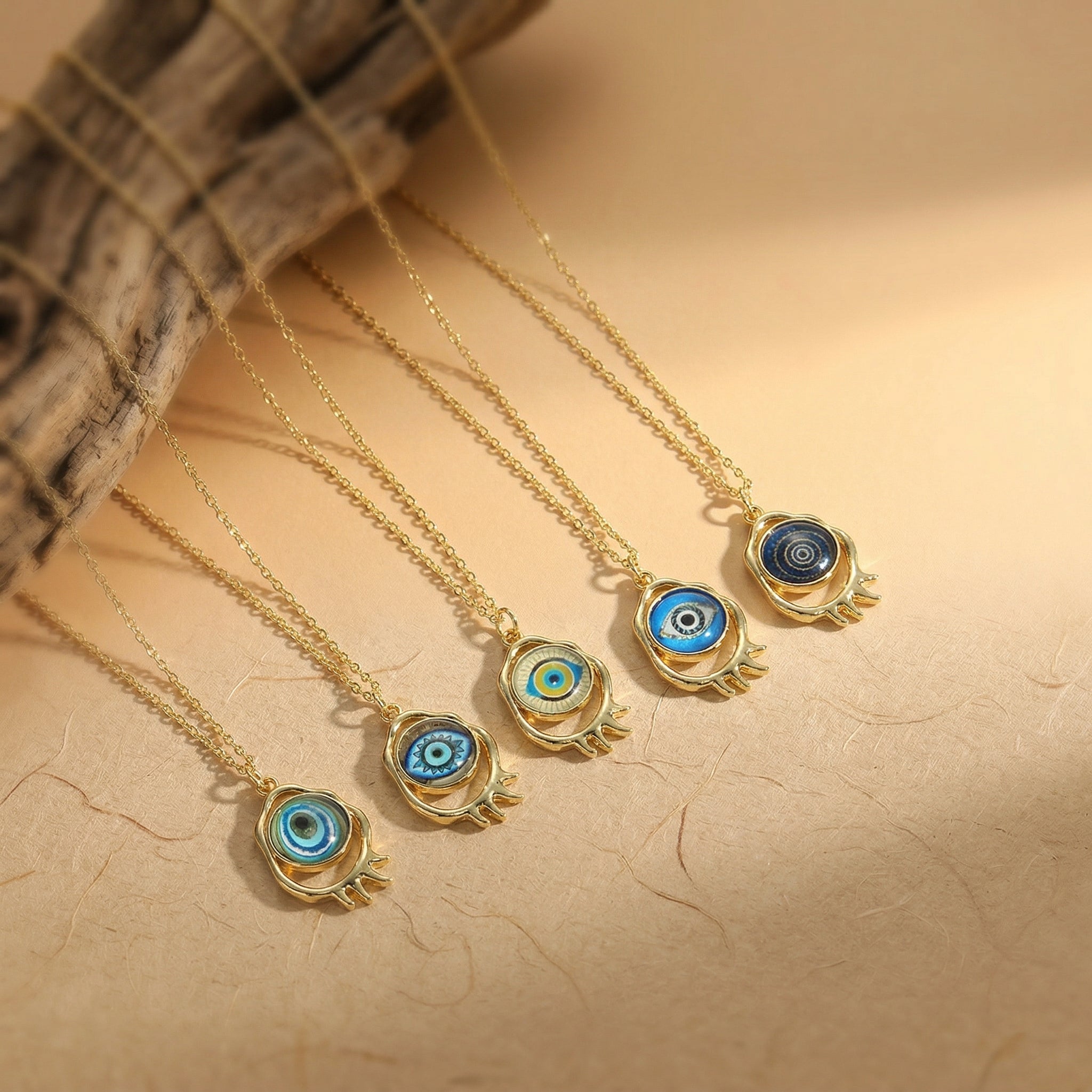 evil eye pendant necklace collection with five symbolic protection styles in gold finish