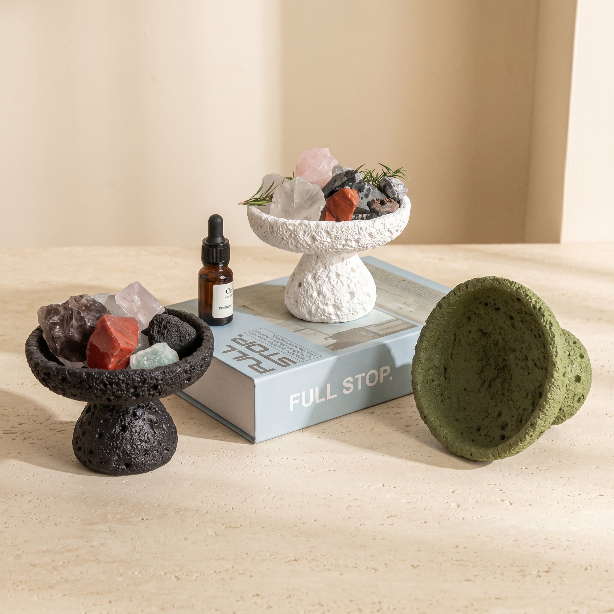 nordic crystal cleansing bowls styled with aroma stones and essential oil for spiritual home decor