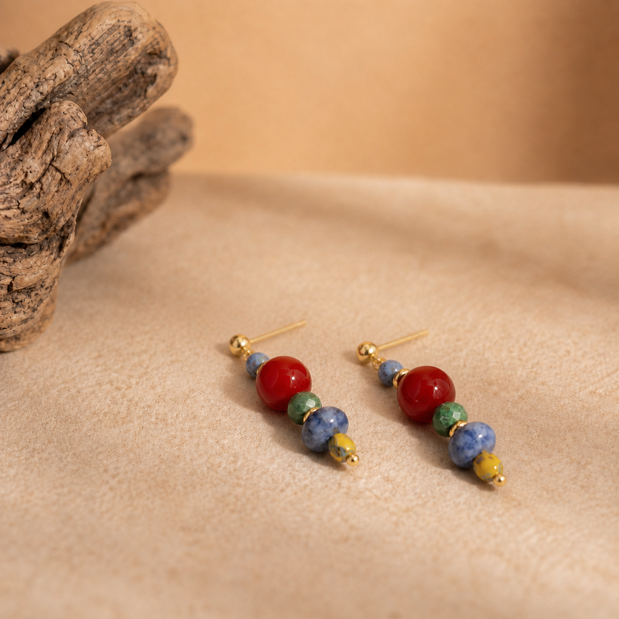 handmade red agate and sodalite drop earrings with colorful gemstone beads and gold tone details