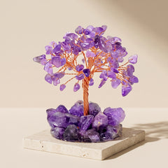 amethyst feng shui money tree with copper wire branches on a natural crystal base