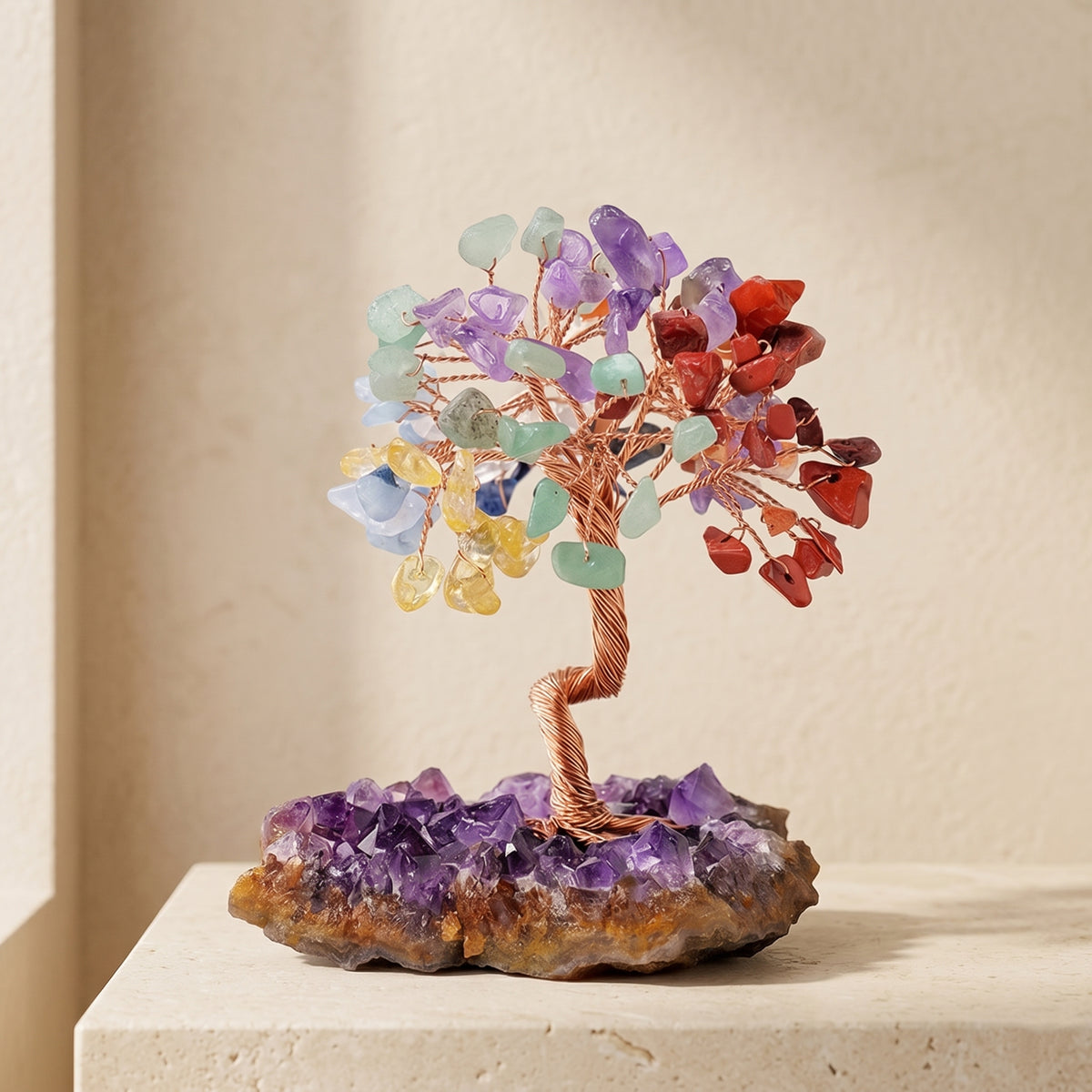 Amethyst and chakra feng shui crystal tree with multicolor gemstone leaves on an amethyst cluster base for spiritual healing decor