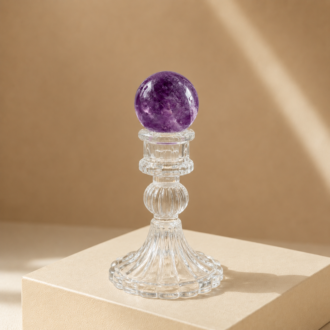 natural amethyst crystal sphere on clear stand for calm spiritual clarity and meditation decor