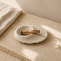 Textured Ceramic Smudge Burner with Palo Santo and clear quartz for crystal cleansing, meditation, and ritual decor.
