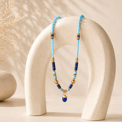 Lapis Lazuli + Turquoise crystal necklace Sunflower crystal necklace with natural stone details symbolizing protection clarity and emotional balance