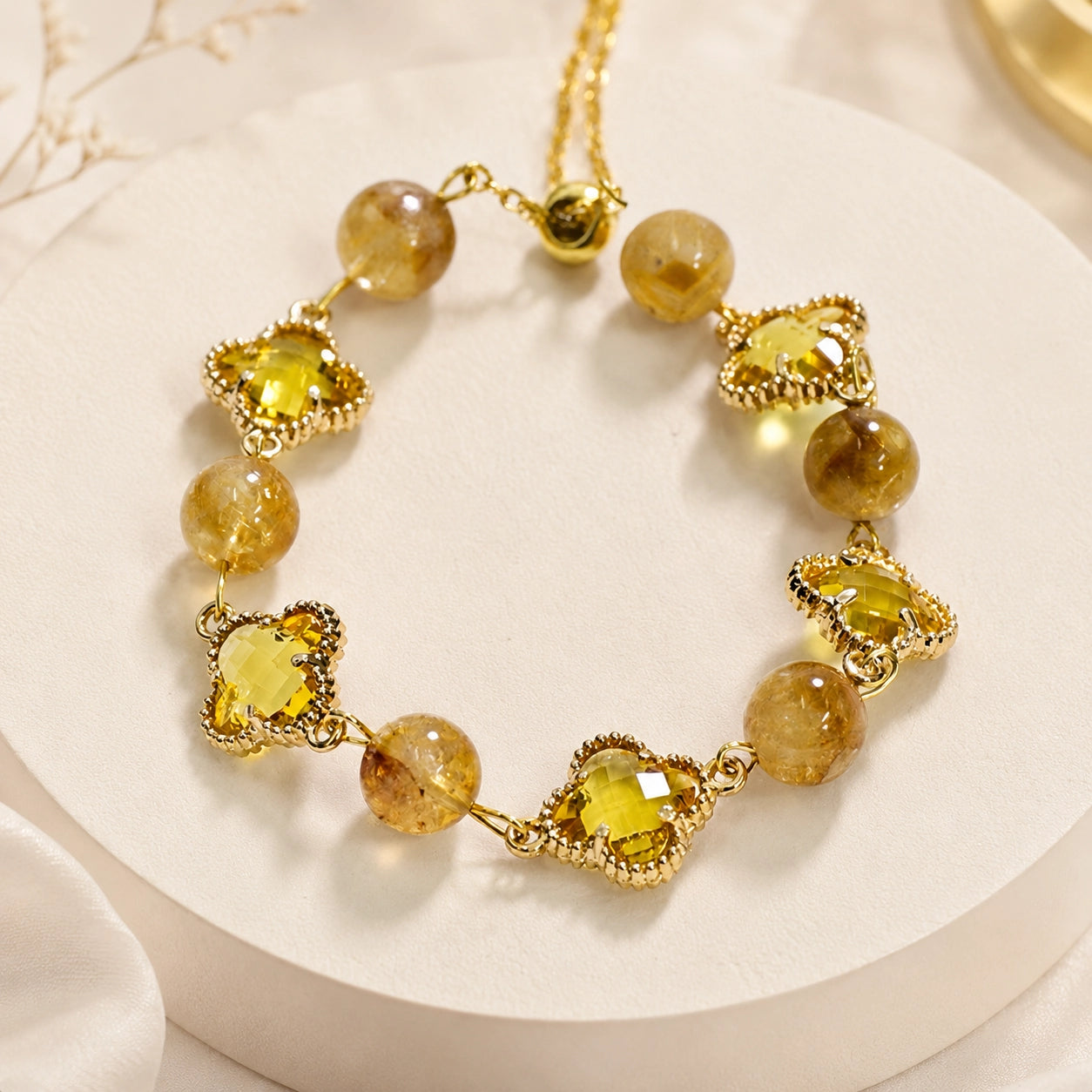Natural citrine four-leaf clover bracelet presented as a meaningful gift