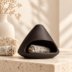 Mount Fuji ceramic incense burner in dark Zisha clay on a natural wooden base