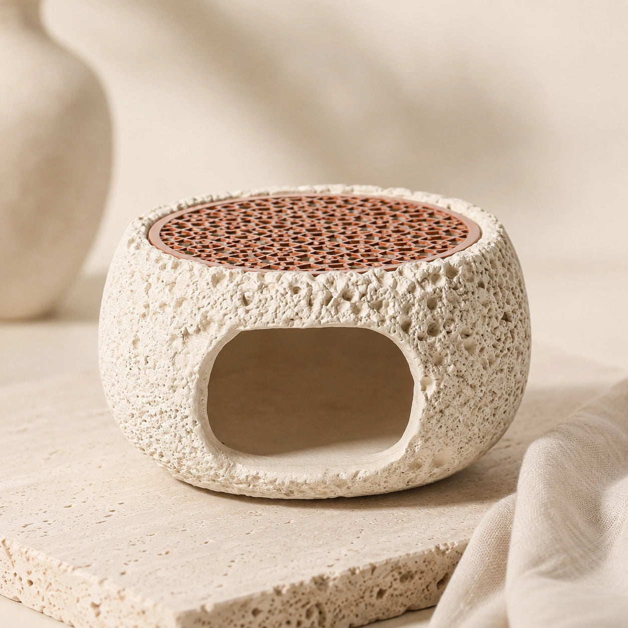 Nordic crystal cleansing burner with textured cream cement body and copper grill for sage and palo santo