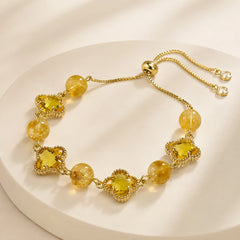 Detailed view of polished citrine beads and 14K gold-plated bracelet accents