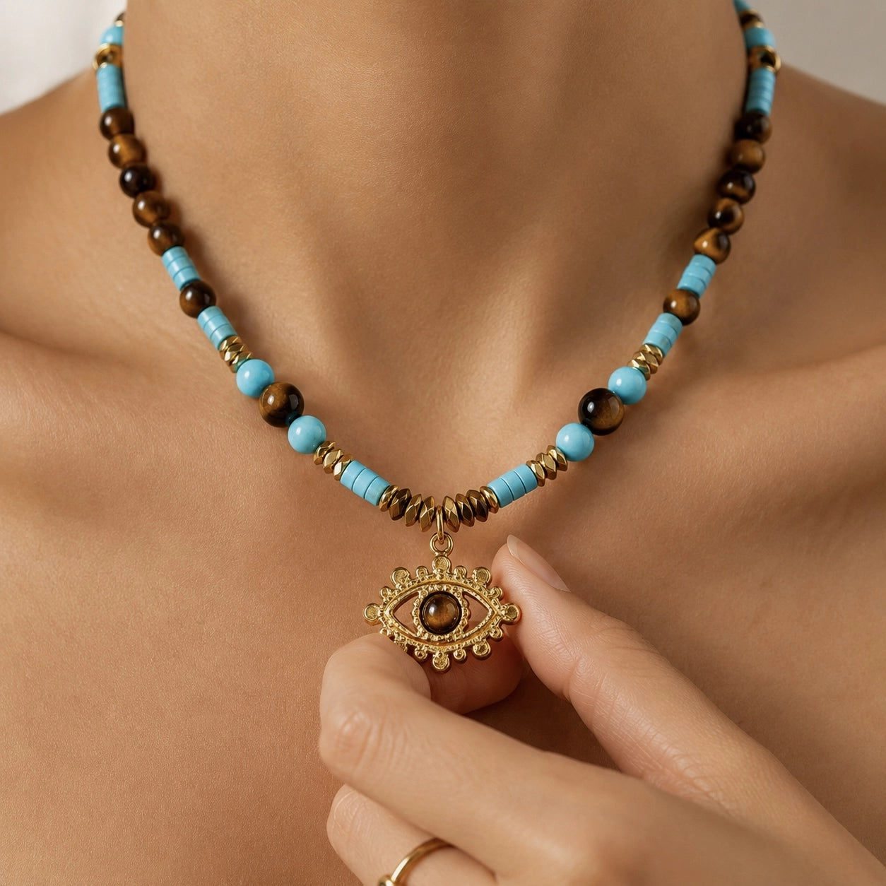 Model Wearing Evil Eye Tiger’s Eye Turquoise Necklace