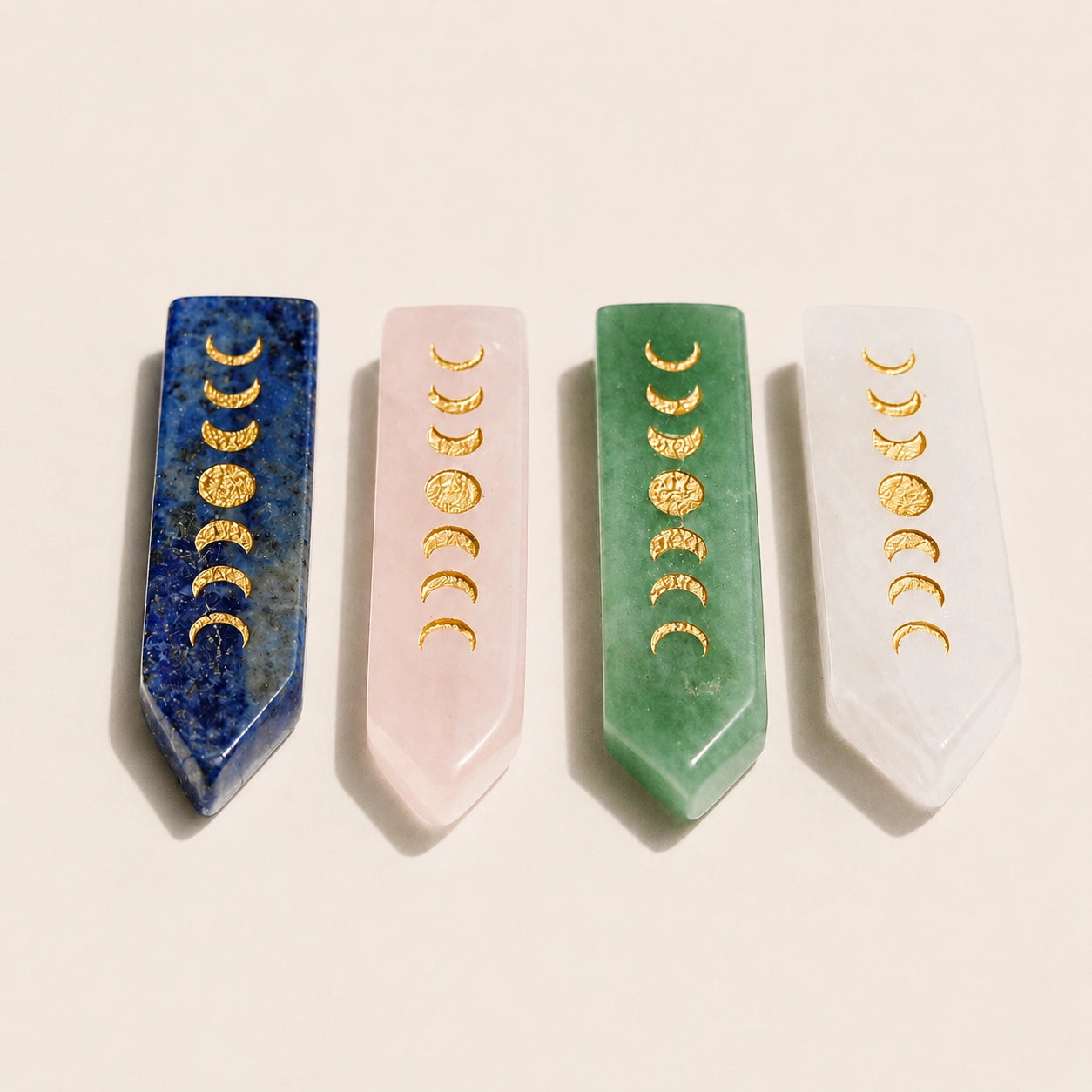 Four moon phase crystal point options displayed on a neutral background
