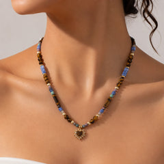 Model Wearing Tiger’s Eye and Sodalite Heart Necklace