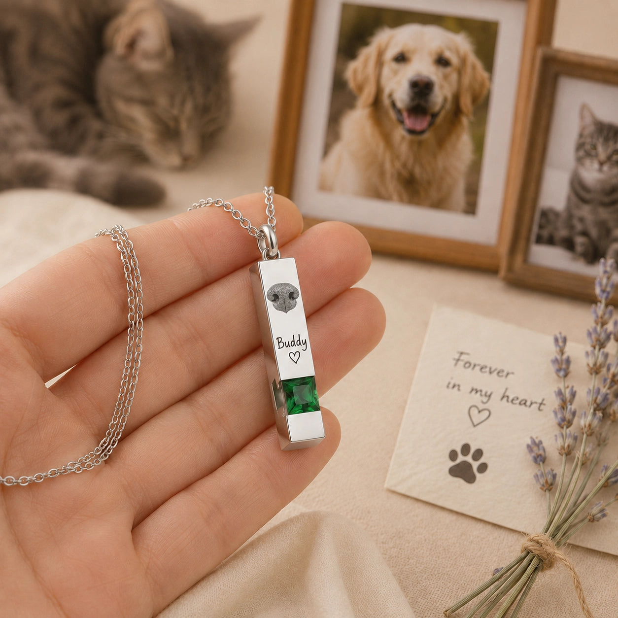 Actual size of a personalized pet nose print urn necklace displayed in a person’s hand