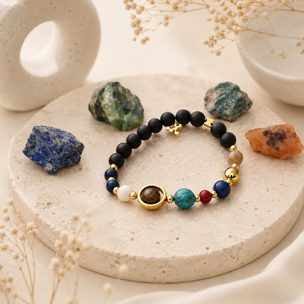 Close view of zodiac crystal set with natural stones and selenite wand for mindful rituals