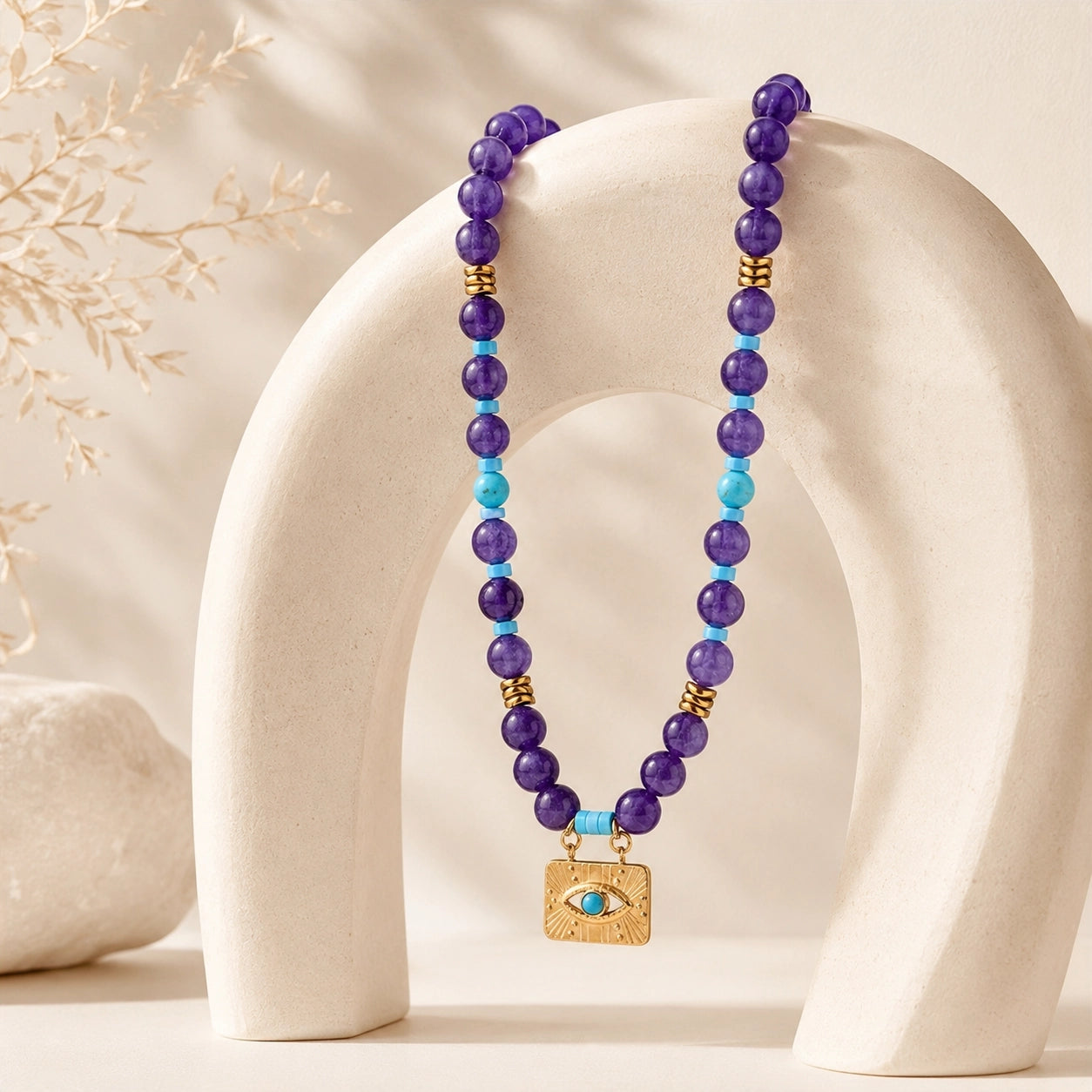 Boho evil eye necklace with amethyst, turquoise, obsidian, and tiger’s eye beads