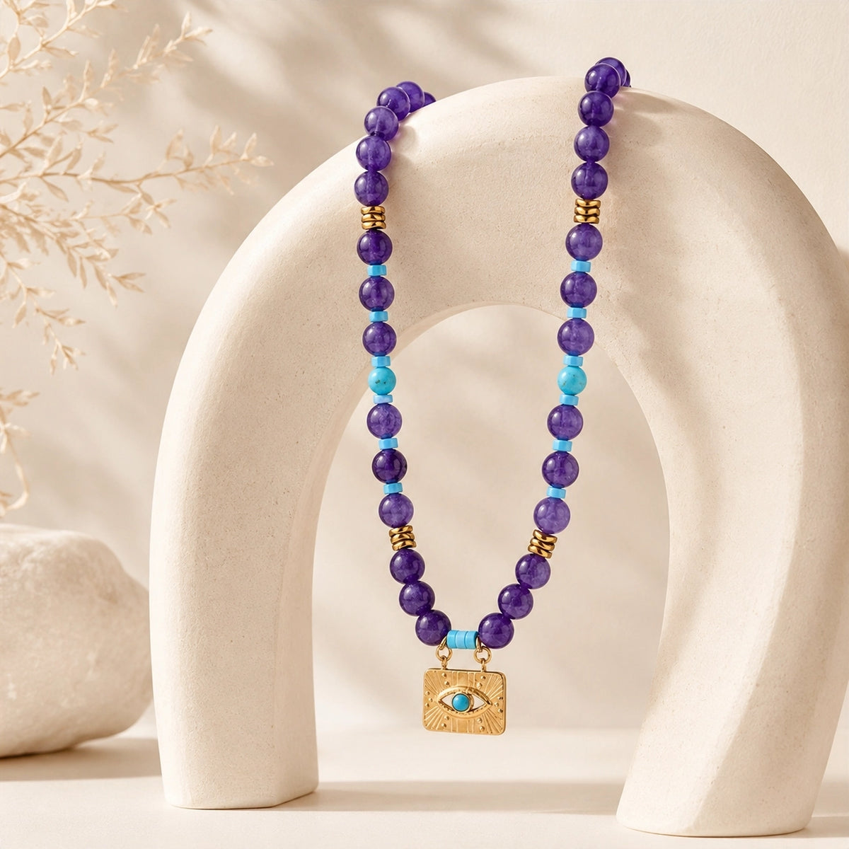 Boho evil eye necklace with amethyst, turquoise, obsidian, and tiger’s eye beads