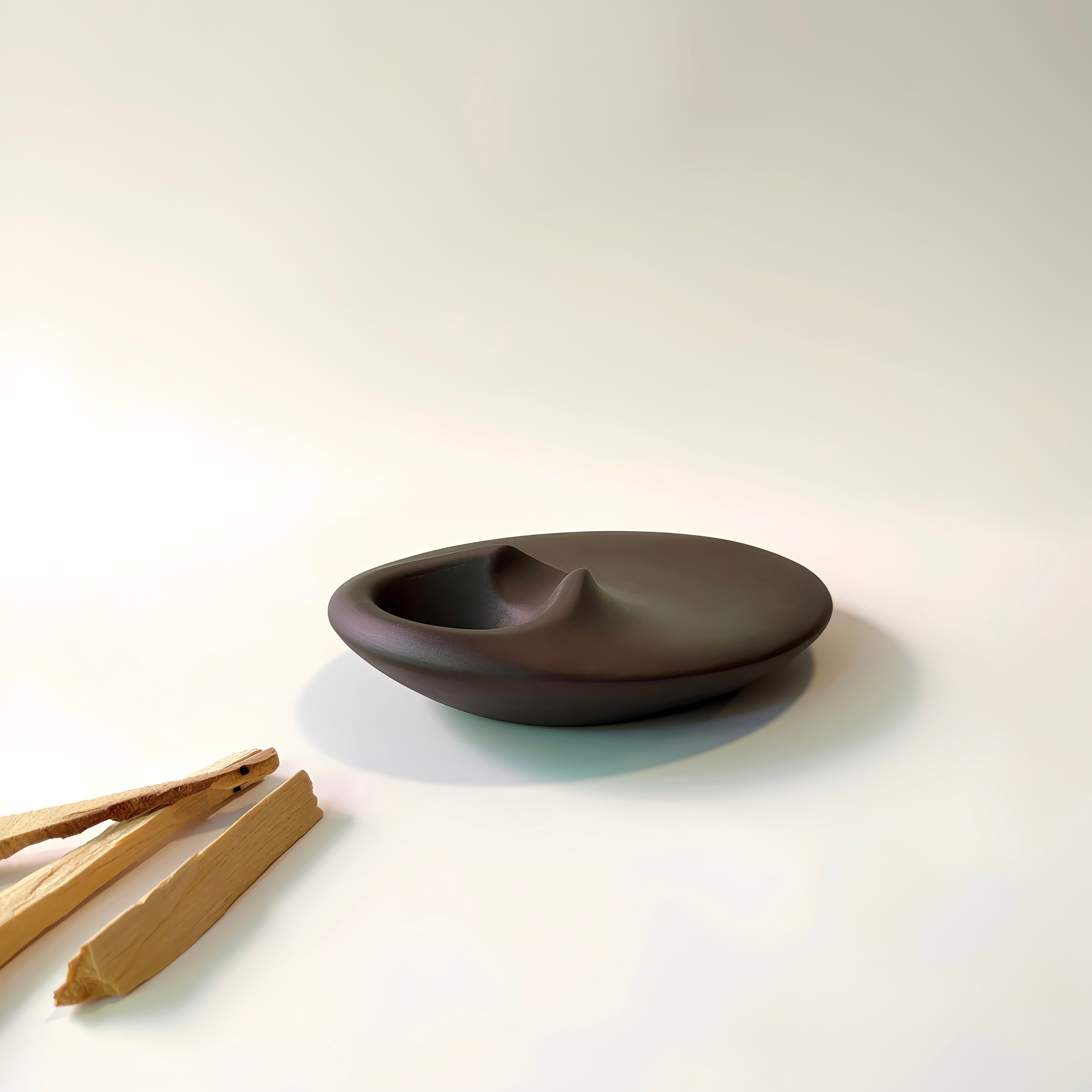 Minimalist brown concrete Palo Santo holder and smudge dish for cleansing, meditation, and crystal rituals