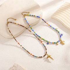 Angel and sea turtle necklace options with colorful beads and adjustable extender chains