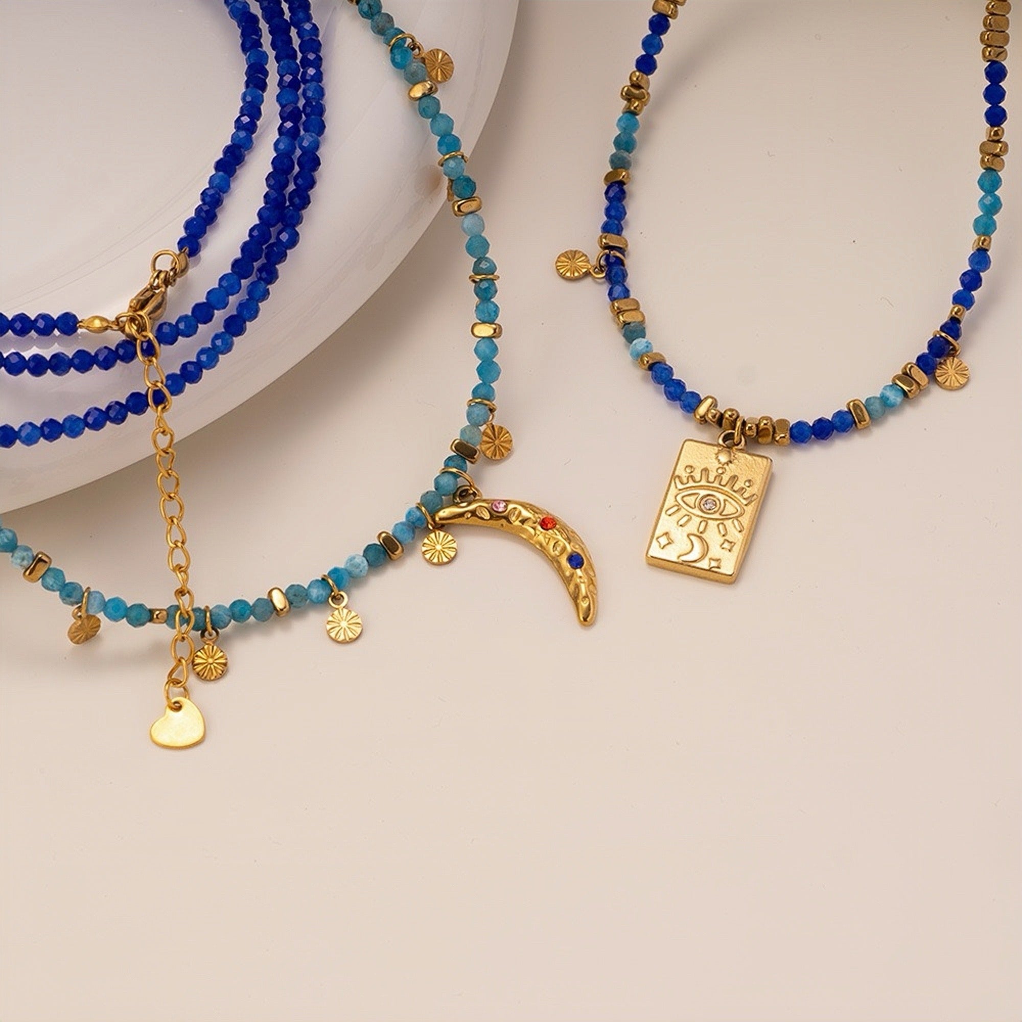 Blue and gold dainty necklace set with moon and evil eye charms