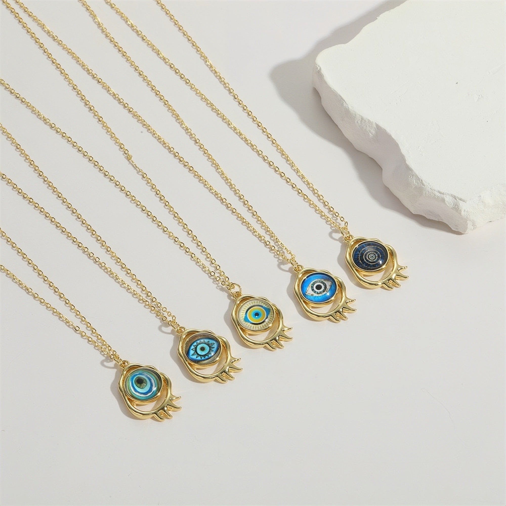 Starburst design evil eye necklace in gold finish