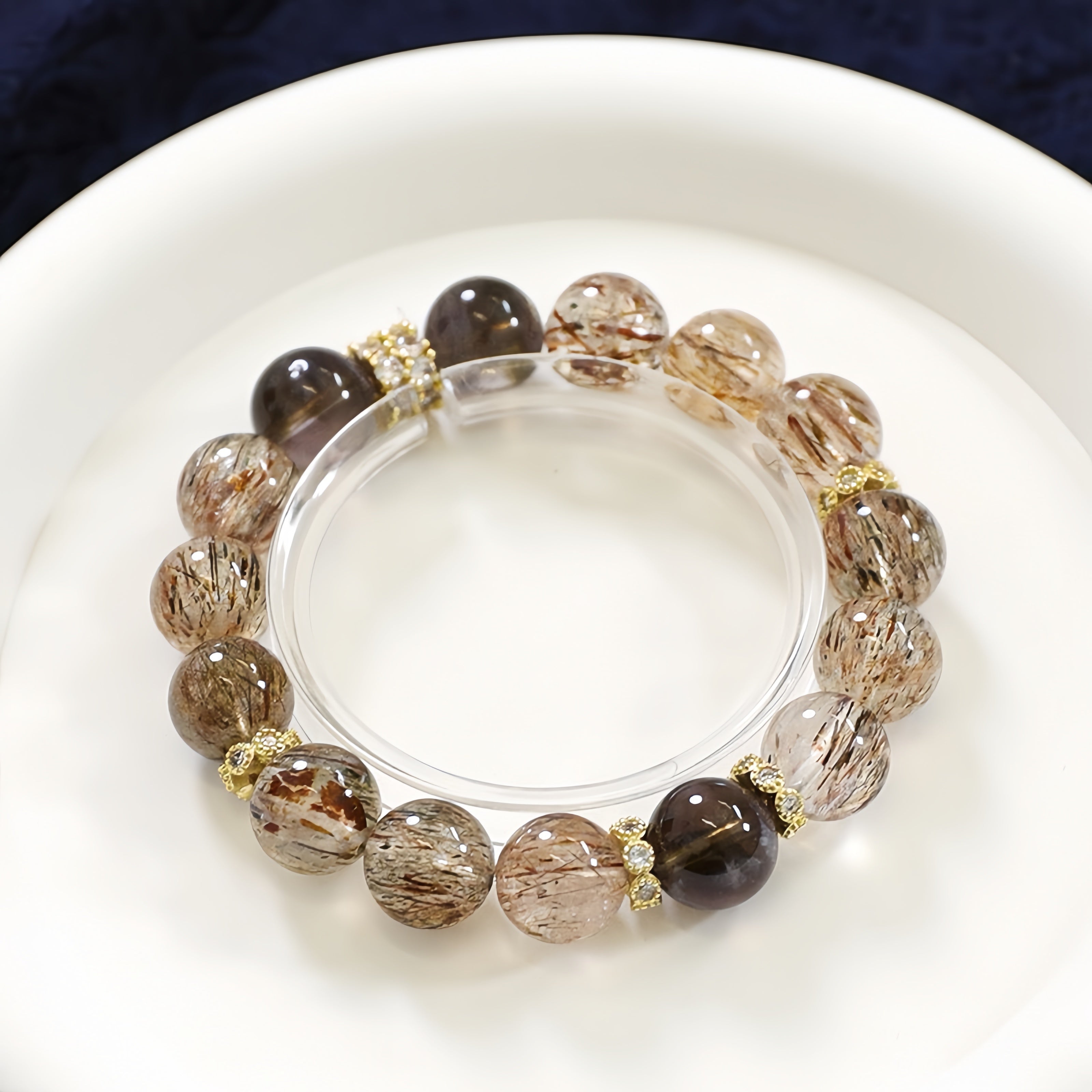 Golden rutilated quartz and smoky quartz bracelet for wealth, grounding, and energy healing