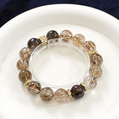 Golden rutilated quartz and smoky quartz bracelet for wealth, grounding, and energy healing
