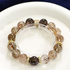 Golden rutilated quartz and smoky quartz bracelet for wealth, grounding, and energy healing