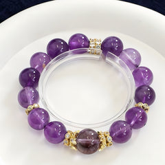 Uruguayan Amethyst healing bracelet with 12mm beads and 14K gold accents