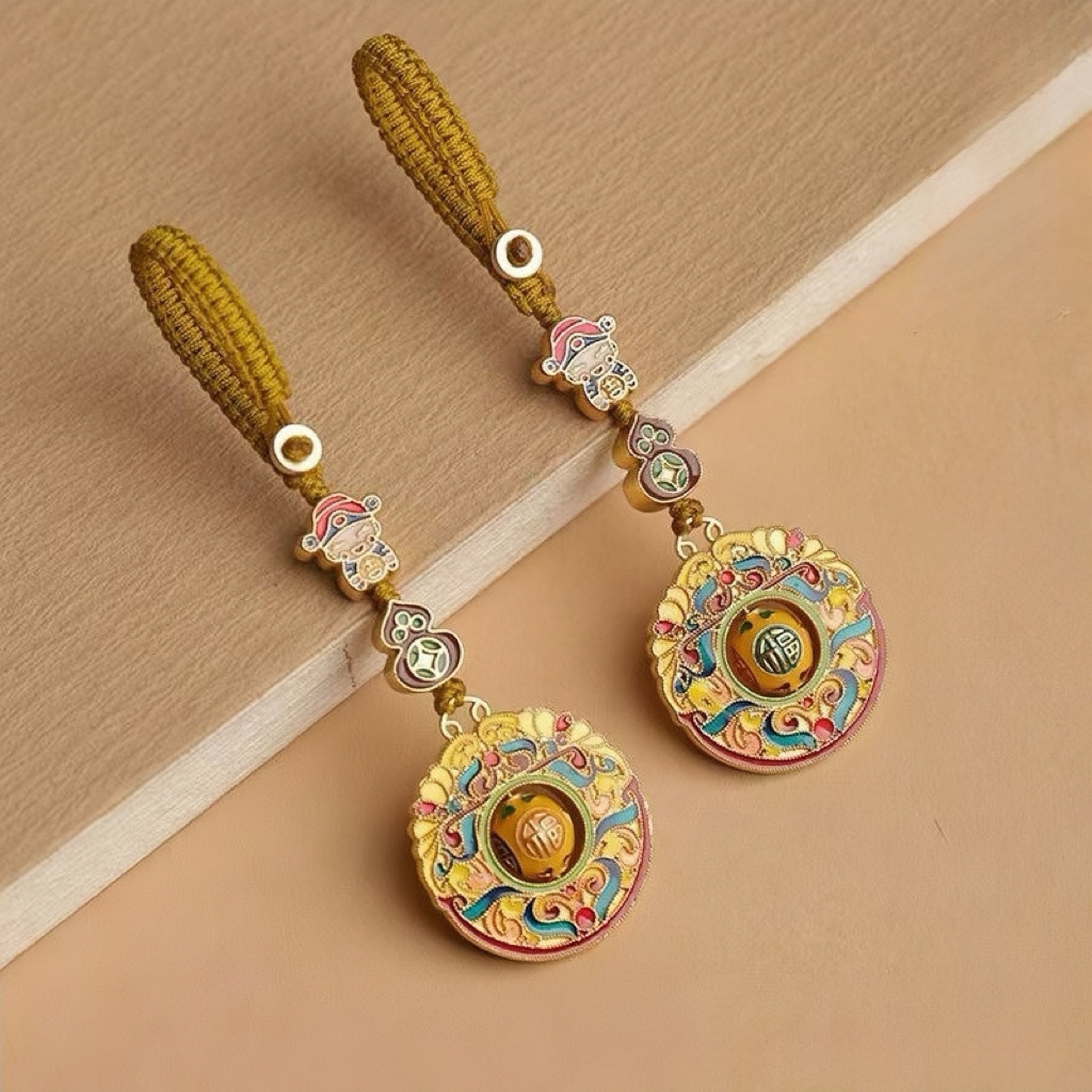 Handcrafted Feng Shui lucky charm pendant with gourd and rotating fortune bead