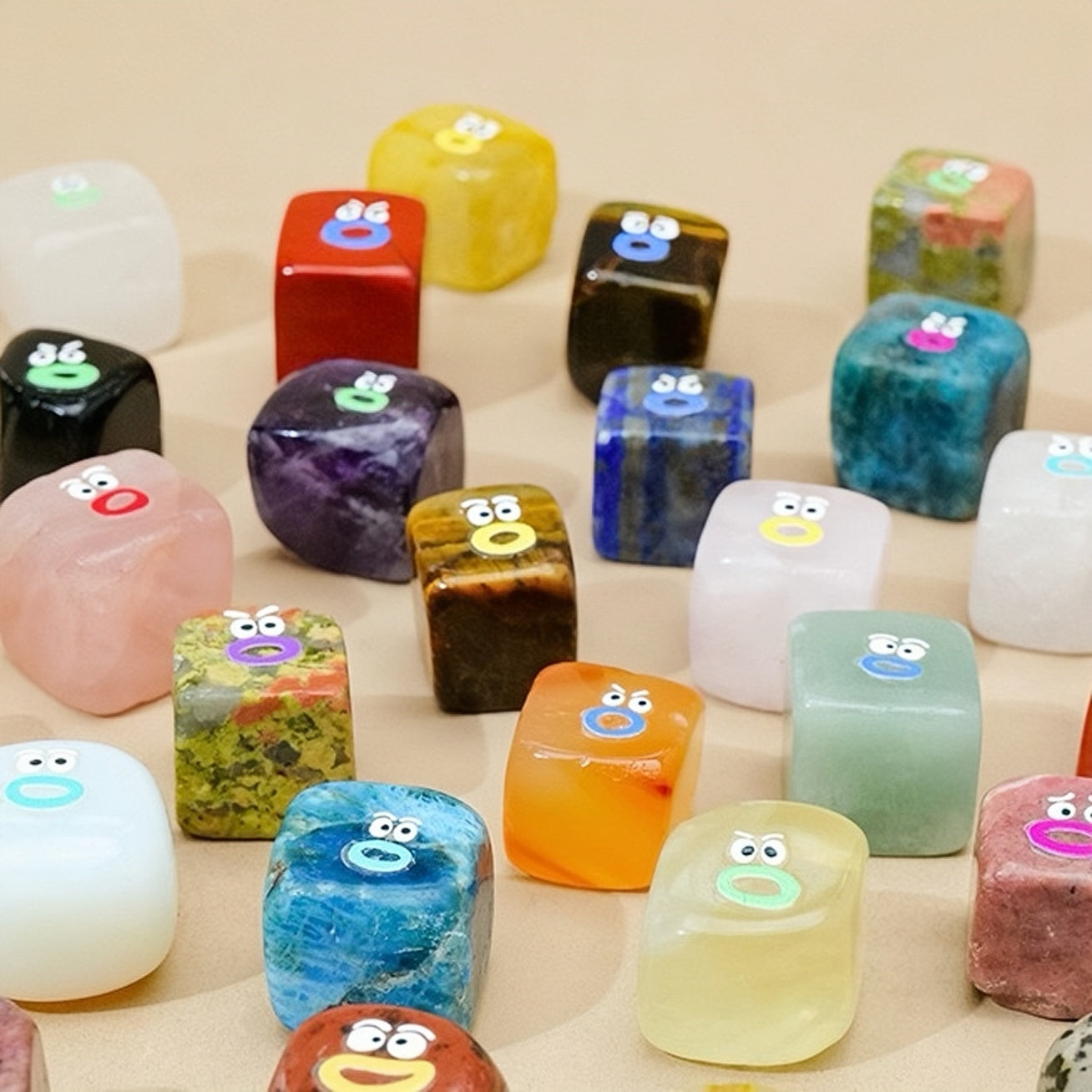 Colorful dice with cartoon faces on a beige background