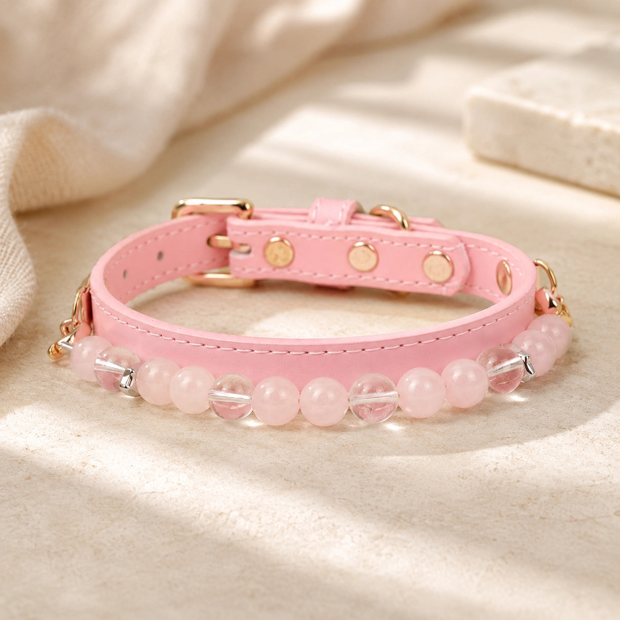 Rose quartz and clear quartz crystal dog collar in pink with gold-tone buckle