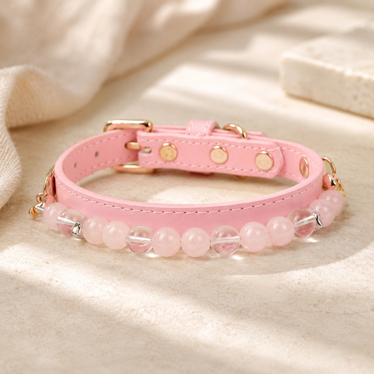 Rose quartz and clear quartz crystal dog collar in pink with gold-tone buckle