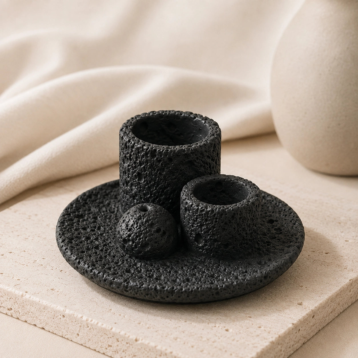 Black Wabi-Sabi concrete smudge bowl and Palo Santo holder with textured finish