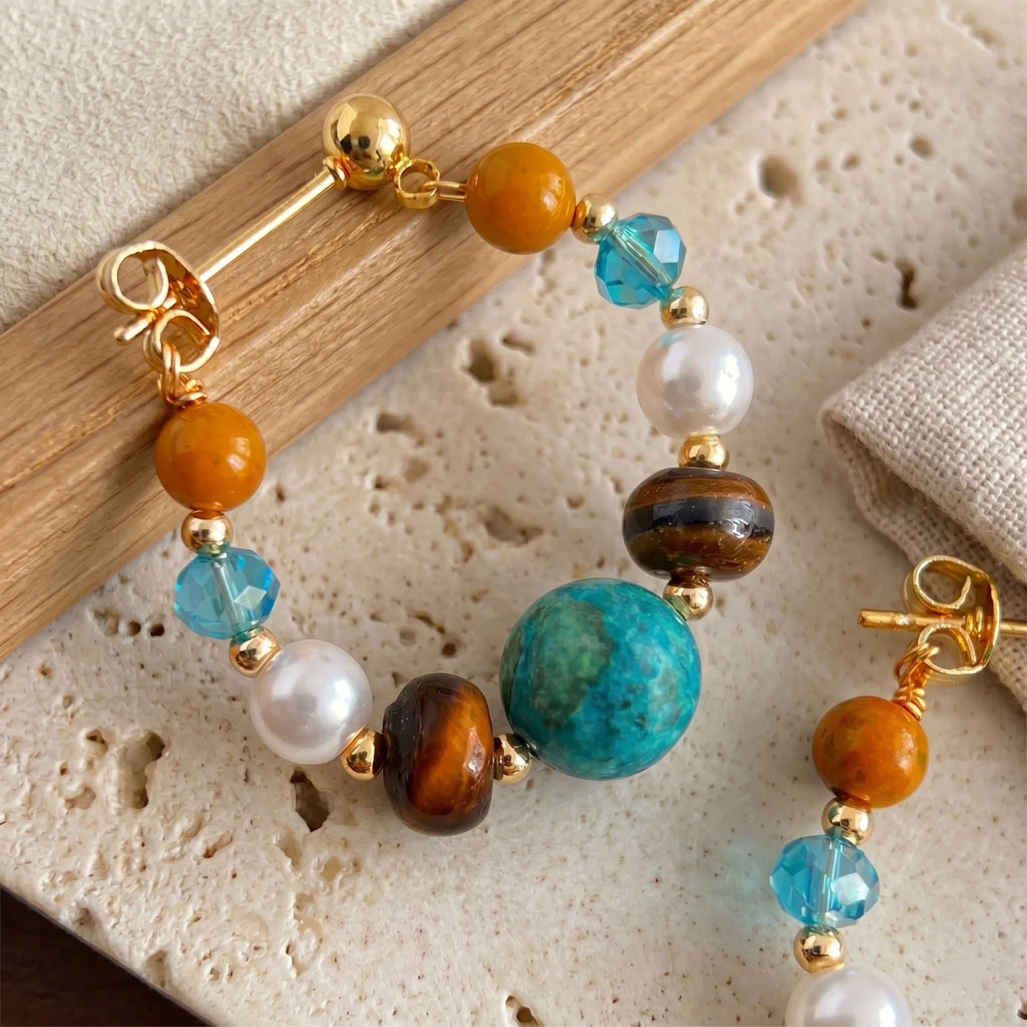 Tiger Eye and Turquoise hoop earrings with colorful gemstone beads and gold-tone details