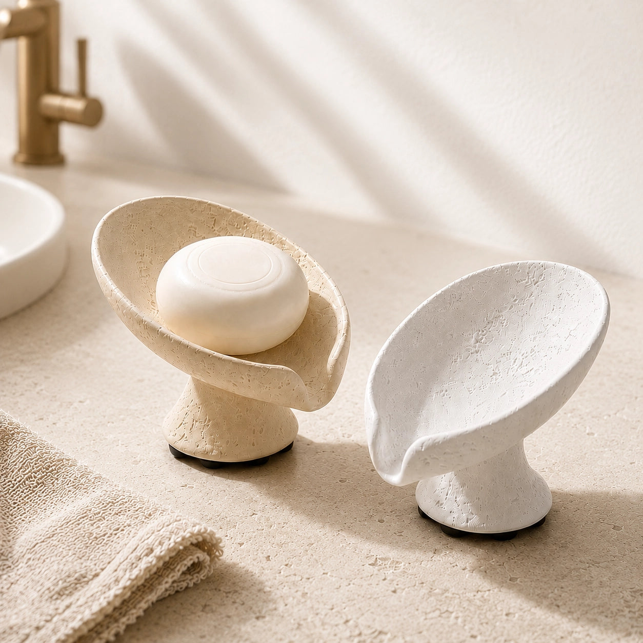Wabi Sabi elevated soap dish with beige and white color options on a calm bathroom countertop.